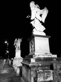 Statue of historical building at night