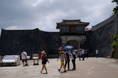 Group of people in front of building