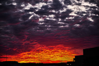 Low angle view of dramatic sky during sunset