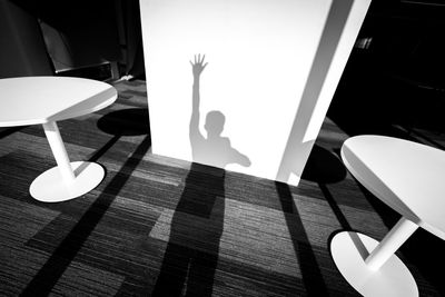 Close-up of chairs on table at home