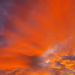 Low angle view of dramatic sky during sunset