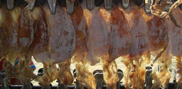 Close-up of meat on barbecue grill