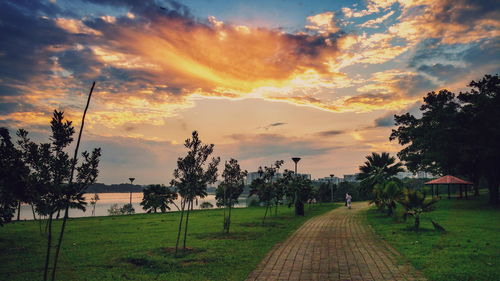 Scenic view of landscape against cloudy sky