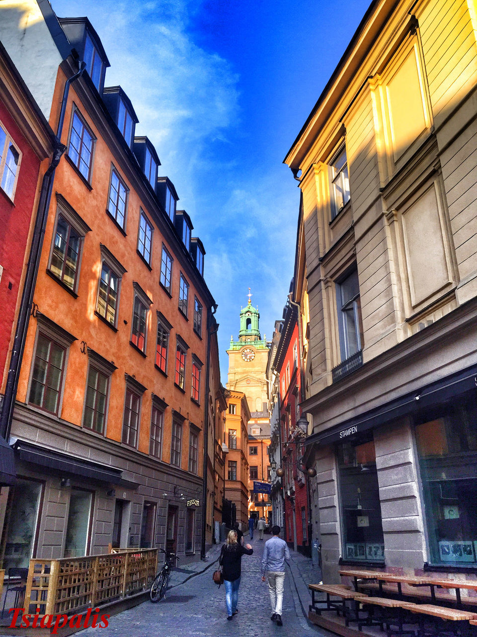 building exterior, architecture, built structure, street, city, residential building, men, walking, residential structure, building, city life, lifestyles, sky, person, the way forward, incidental people, window, outdoors