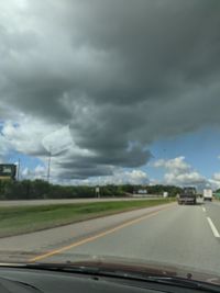 Road seen through car windshield