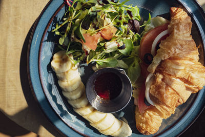 Top view of food in plate on table