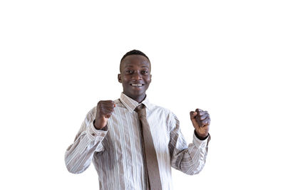 Portrait of young man against white background