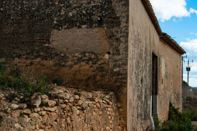 The stone wall of an old building