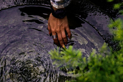 High angle view of person working in water