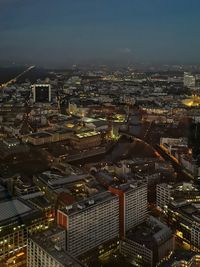 High angle view of illuminated buildings in city