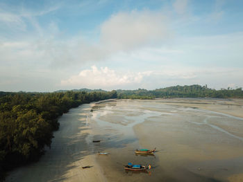 Scenic view of beach against sky