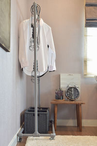 Clothes hanging on rack at home