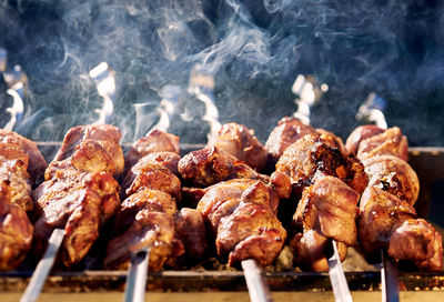 High angle view of meat on barbecue grill