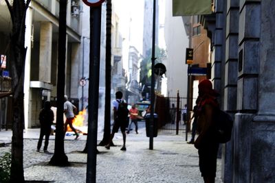 People on street in city