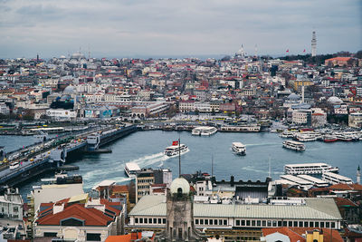 High angle view of river amidst buildings in city