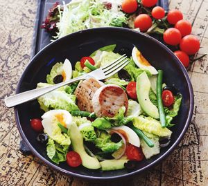 High angle view of salad in bowl on table