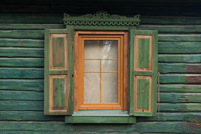 Closed wooden door of old building