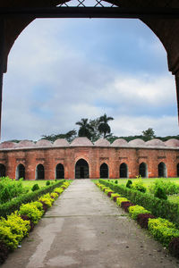 View of historical building against cloudy sky