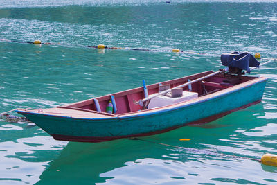 High angle view of fishing boats moored on sea