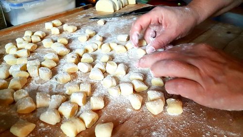 Close-up of man preparing food