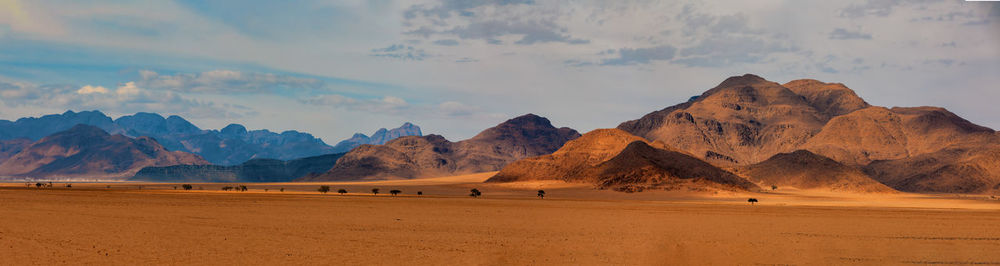 Scenic view of desert against sky