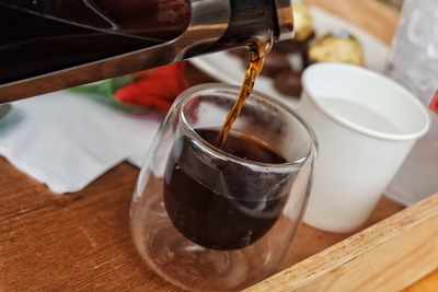 Close-up of coffee cup on table