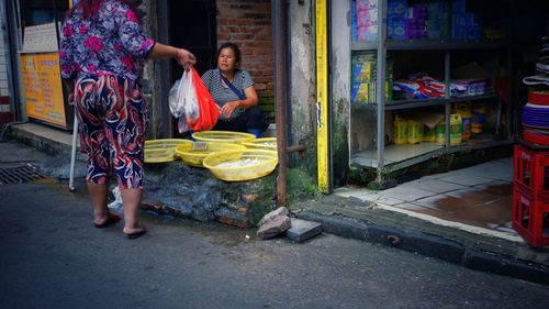 People on street in city