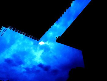 Low angle view of building against blue sky