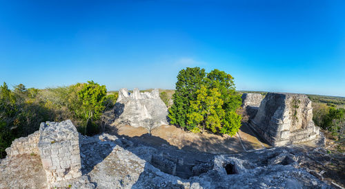 Scenic view of rock formation against clear blue sky