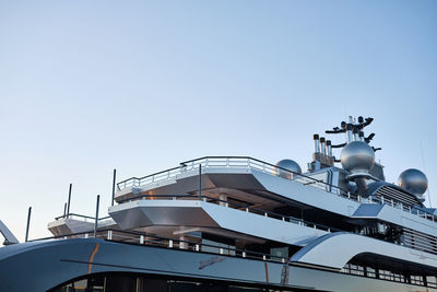 Low angle view of ship against clear sky