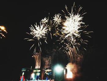 Firework display at night