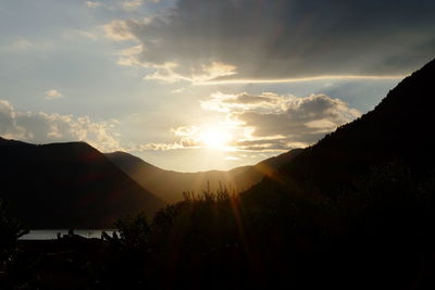 Scenic view of mountains against sky during sunset