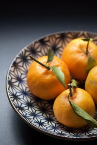 High angle view of orange fruit on table