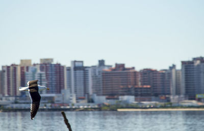 View of cityscape against clear sky