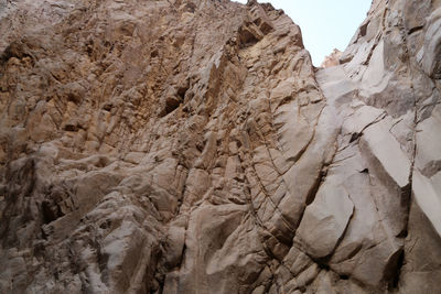 Low angle view of rock formation on land