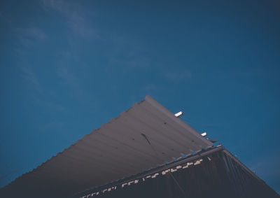 Low angle view of roof against sky