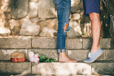 Low section of people standing on steps