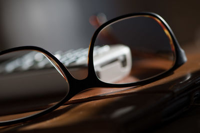 Close-up of eyeglasses on table