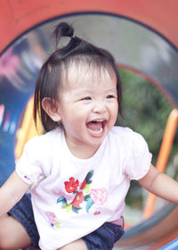 Close-up of cute girl playing