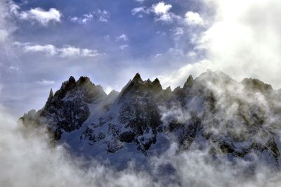 Scenic view of snowcapped mountain against sky