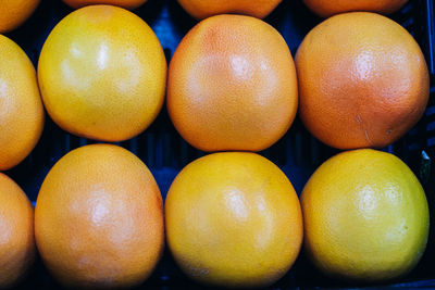 Full frame shot of oranges in market