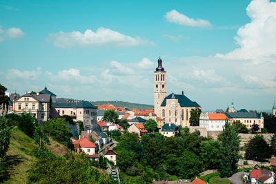 Buildings in city against sky