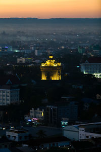 High angle view of illuminated buildings at night