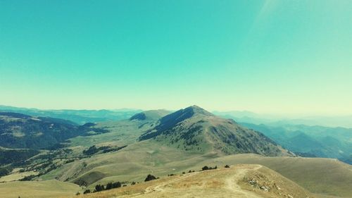 Scenic view of mountains against clear sky