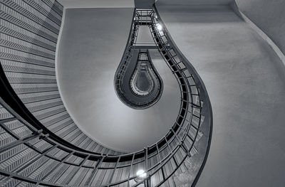 Low angle view of spiral staircase in building