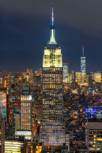 Illuminated buildings in city at night