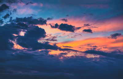 Low angle view of clouds in sky during sunset
