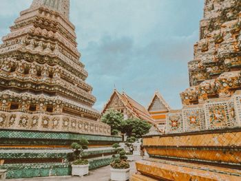 Low angle view of temple against building