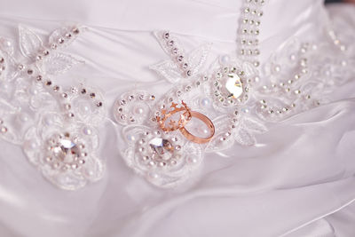 Jewelry on wedding dress