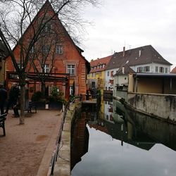 Houses in town against sky